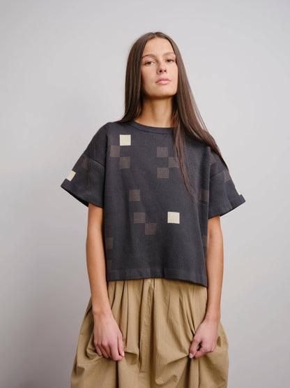 The Endery Albers Short Sleeve Sweater Tee in the Obsidian Palette