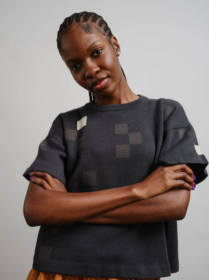 The Endery Albers Short Sleeve Sweater Tee in the Obsidian Palette